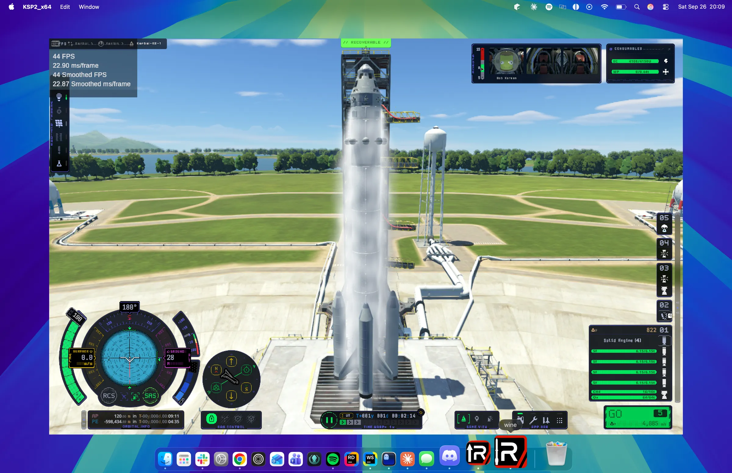 KSP2 Redux running in a window on macOS, with a rocket on the launch pad at the KSC and the macOS menu bar and Dock visible